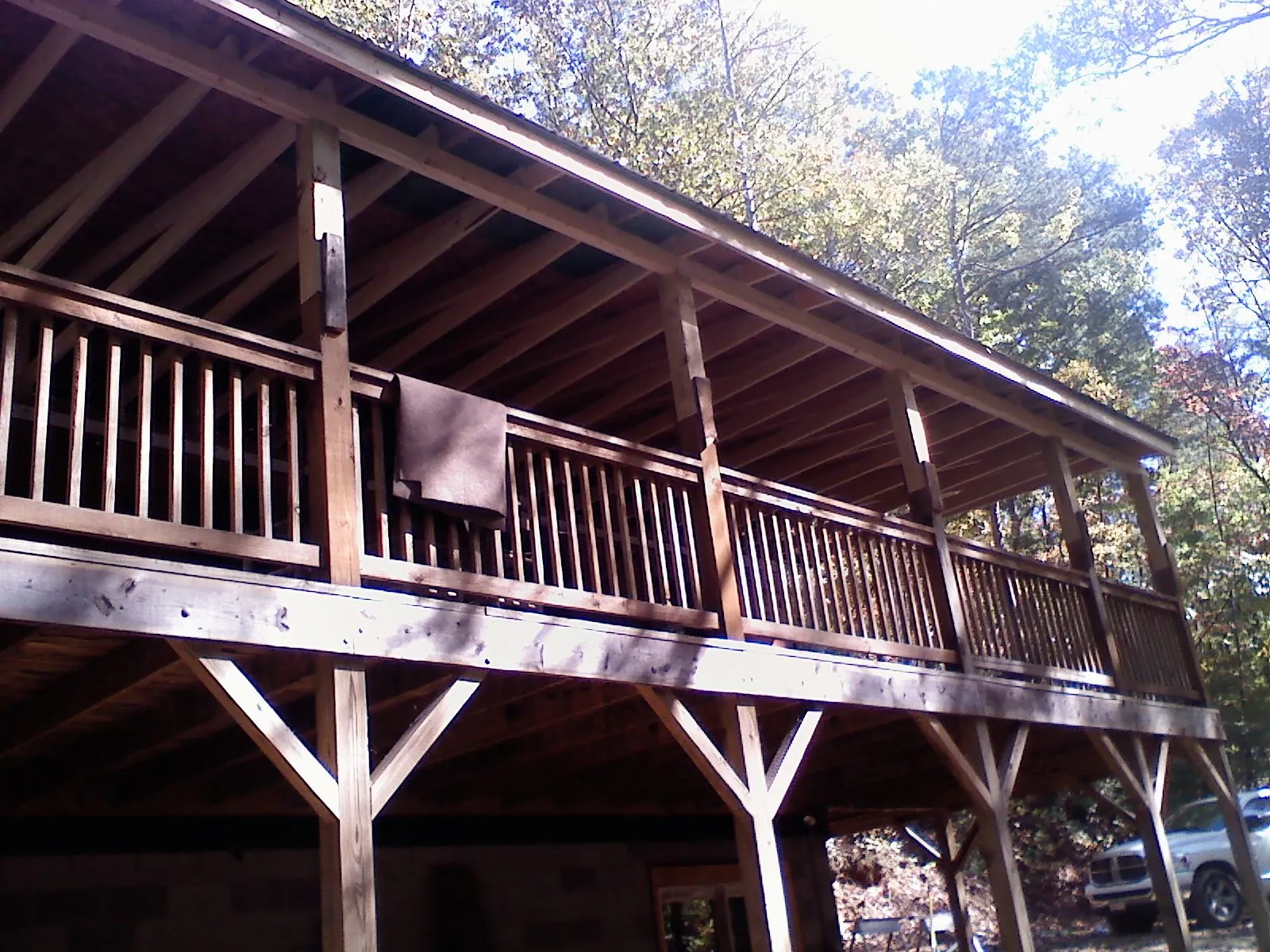 Timber framing under a new elevated porch and deck — Roof Leak Repair in French Lick by Roofing Brothers